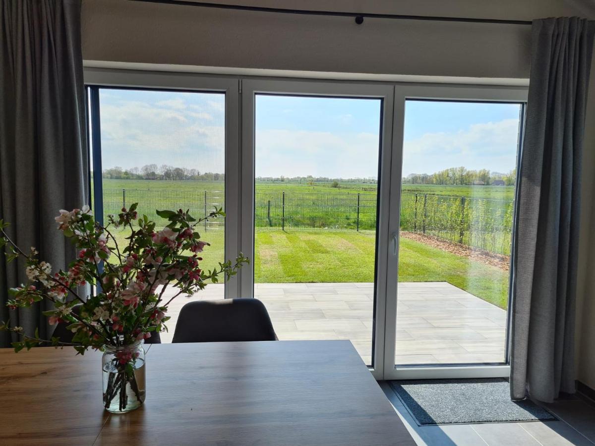 Watt'N Blick - Hundefreundliches Ferienhaus Mit Ausblick Ueber Die Wiesen Bis Zum Deich Schweiburg Esterno foto
